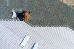 roofer repairing a roof